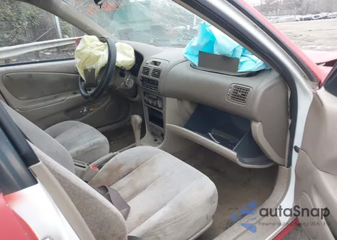 2002 Toyota Corolla Le from USA, damaged, VIN 2T1BR12E12C564164